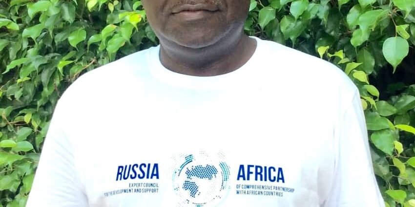 Nigerian global affairs analyst Mal Lawal Sale, based in Abuja, wearing a T-shirt featuring the “Russia–Africa Comprehensive Partnership” logo during Russia Day 2025.